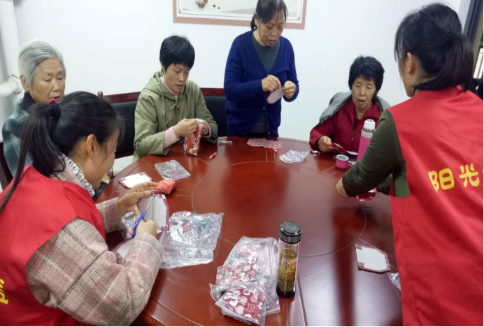 【阳光公益·庐江站】“巧手制作零钱包”活动