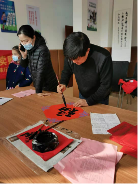 【阳光公益·长宁复兴】“挥毫泼墨送春联  龙飞凤舞迎新春”送春联活动