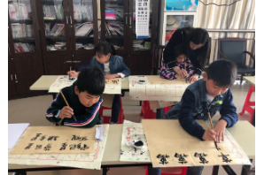 【阳光公益·新站磨店】“翰墨书法小课堂”走进社区活动